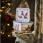 Sett med to bokser i tinn med julemotiv