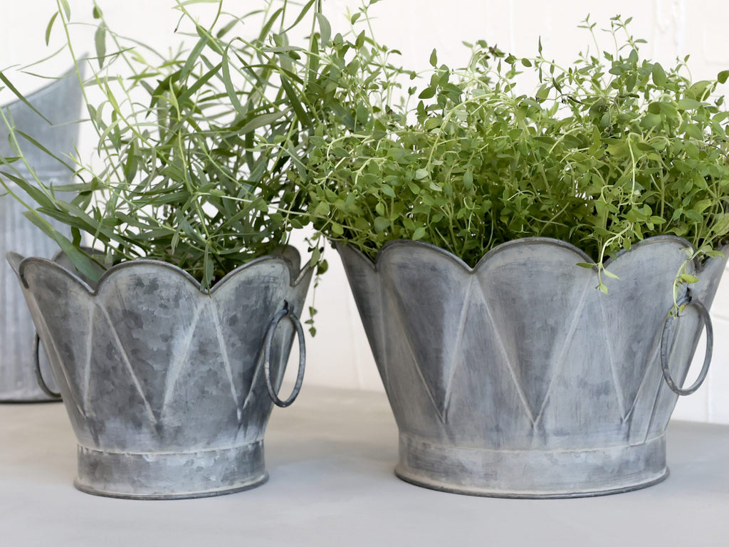 Potteskjuler i sink- to størrelser